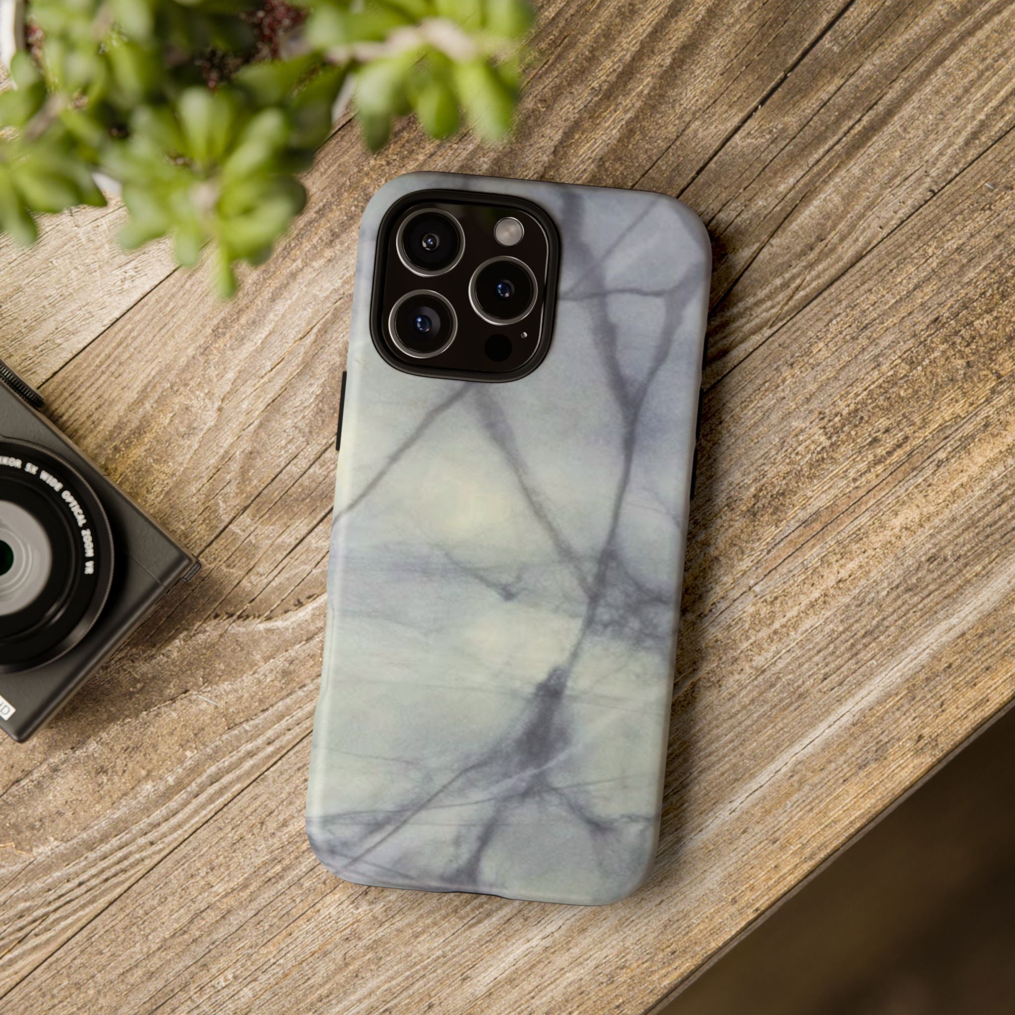 Phone case in impressive grey marble design with shock absorbing dual layer shell and UV resistance in 3D wrap