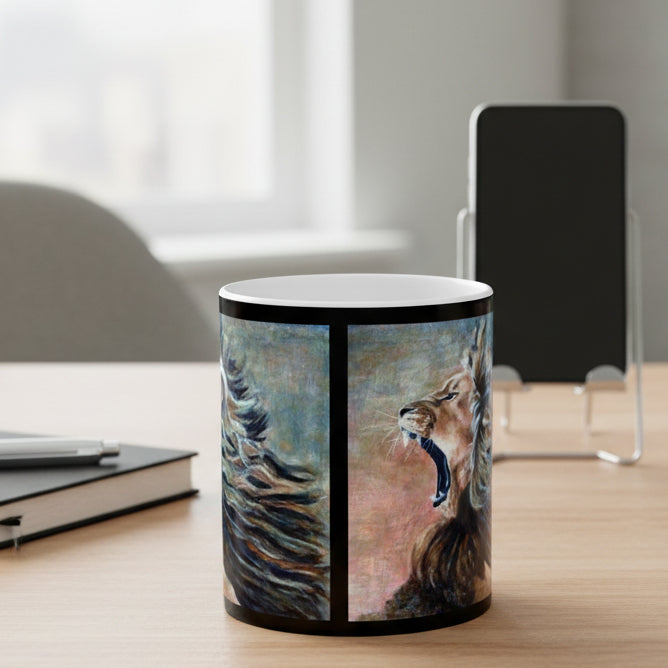 11oz white ceramic mug with a black rim, featuring a wrap-around artistic print of a lion's head and mane in blue, brown, and pink tones - dishwasher and microwave safe