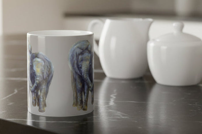 Mug with two pair of painted elephants on a gray background 11oz.