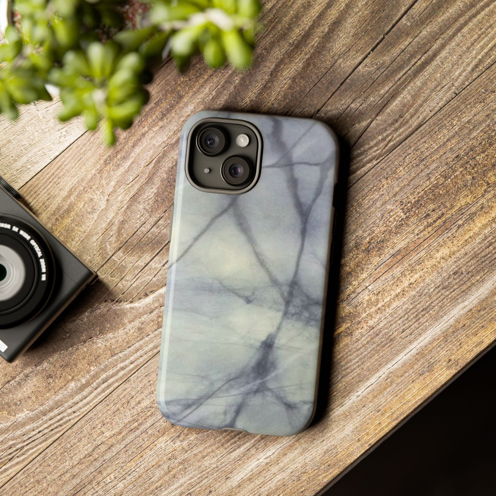 Phone case in impressive grey marble design with shock absorbing dual layer shell and UV resistance in 3D wrap