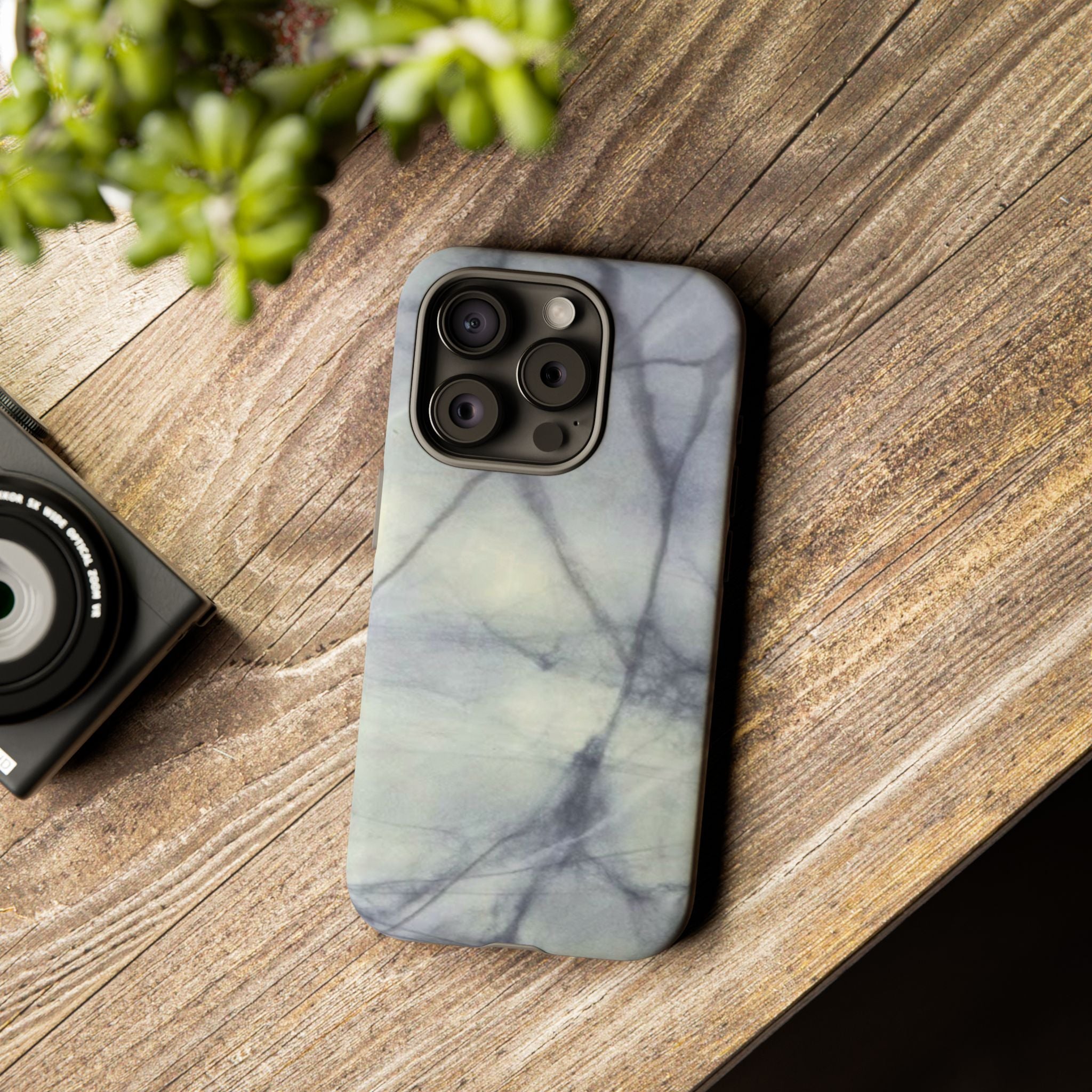 Phone case in impressive grey marble design with shock absorbing dual layer shell and UV resistance in 3D wrap