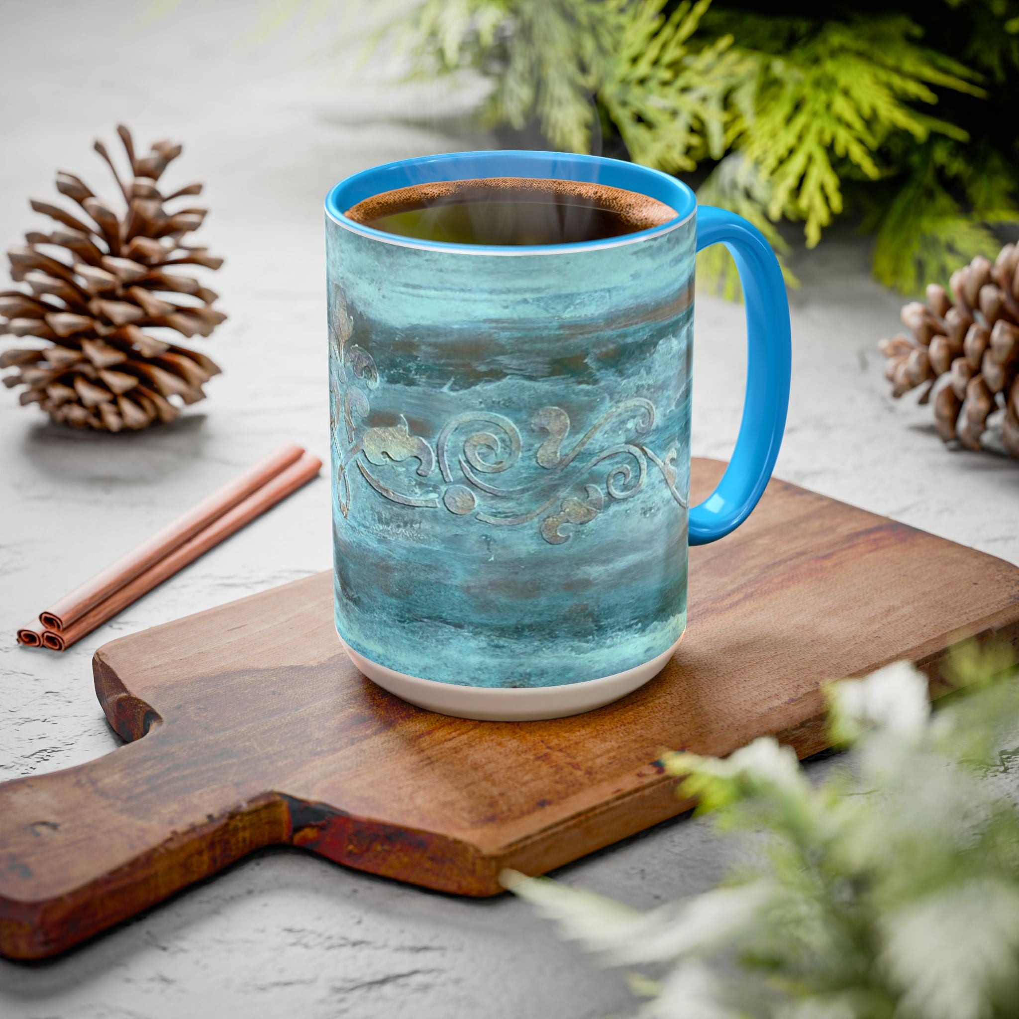 Teal mug with a unique scroll pattern with choice of accent colors for interior and handle