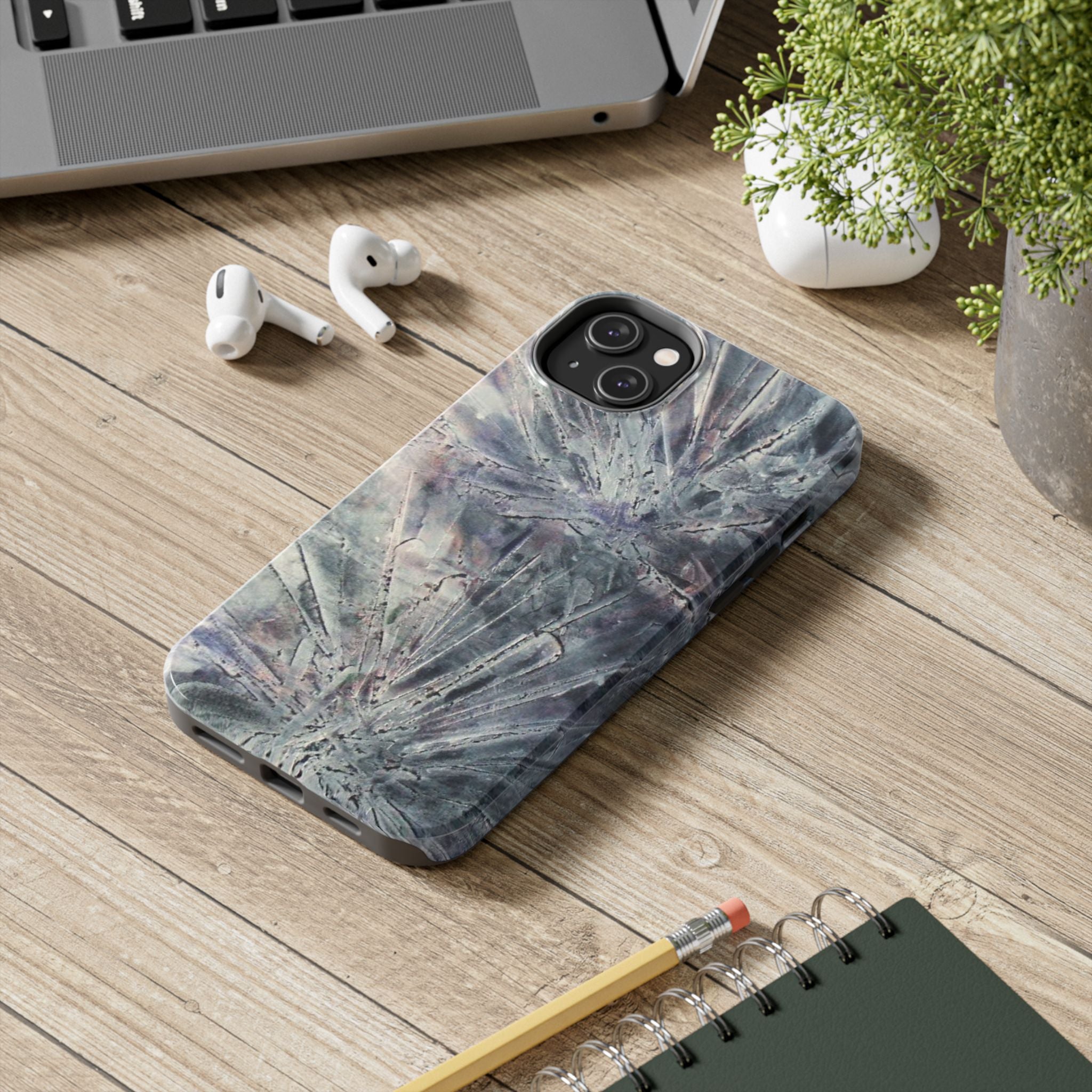 Phone case in abstract bursts of silver crystal design with rubber lining for strong impact and UV protection