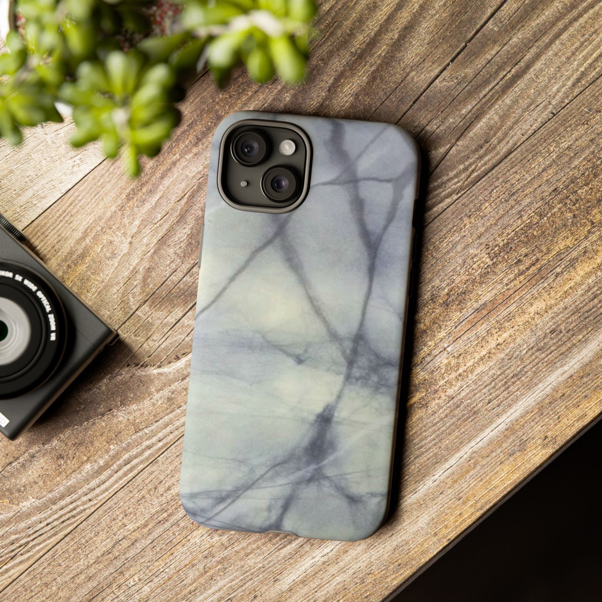 Phone case in impressive grey marble design with shock absorbing dual layer shell and UV resistance in 3D wrap