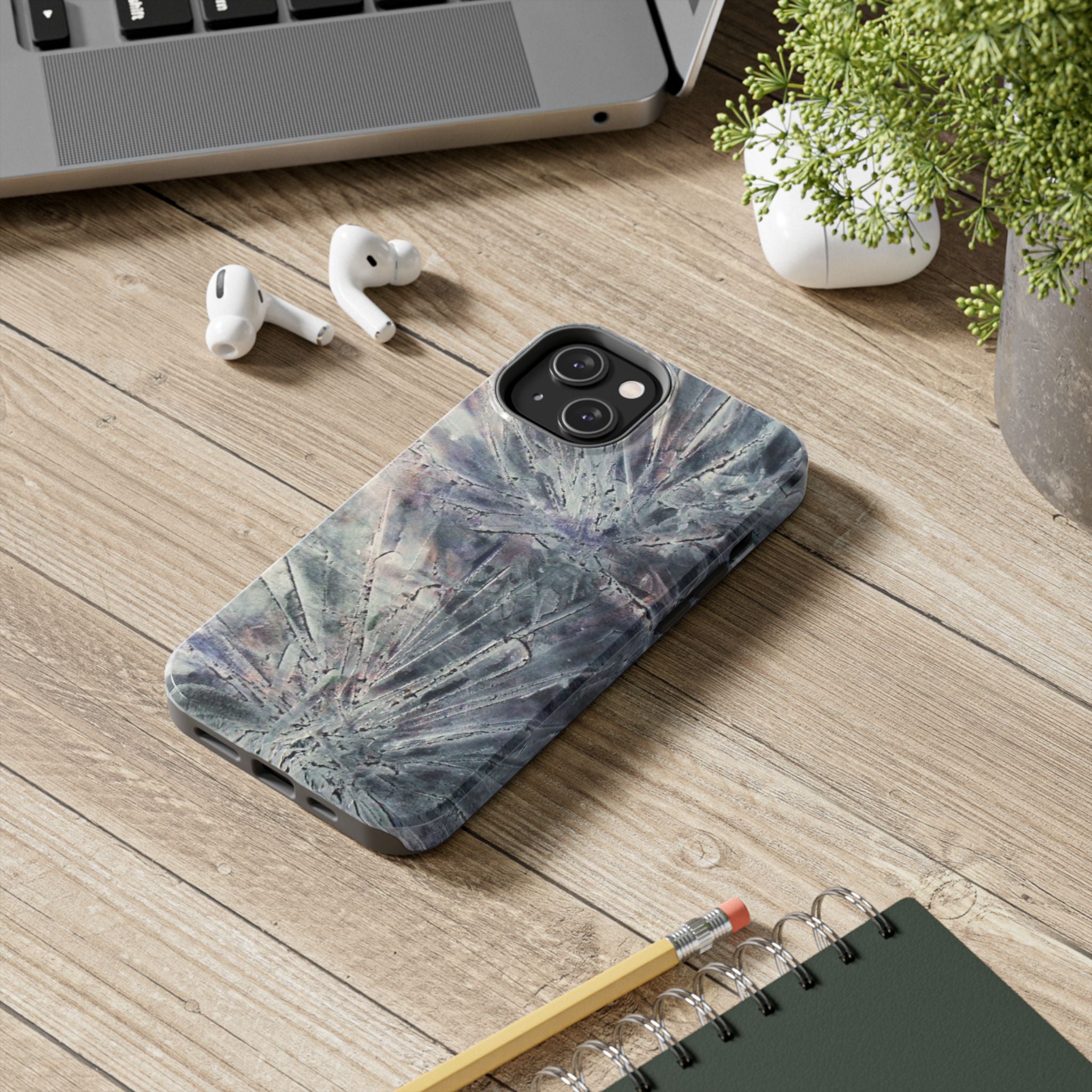Phone case in abstract bursts of silver crystal design with rubber lining for strong impact and UV protection