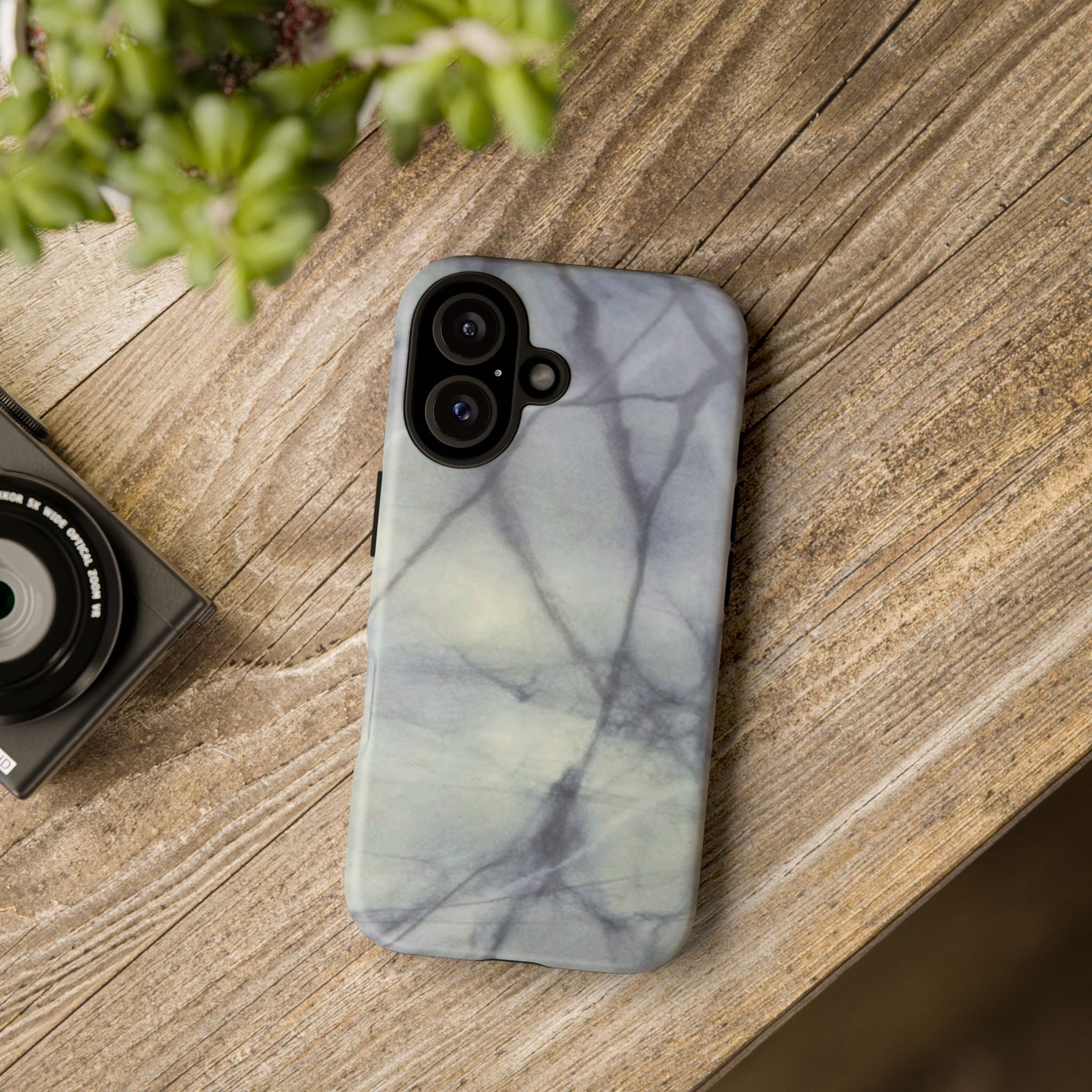 Phone case in impressive grey marble design with shock absorbing dual layer shell and UV resistance in 3D wrap