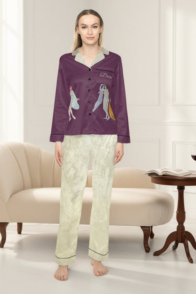 Classy two-piece lounging pajama set consisting of a long-sleeve tailored, button-up top in deep plum with painted vintage nude divas and matching light beige muted abstract pajama pants. M/L
