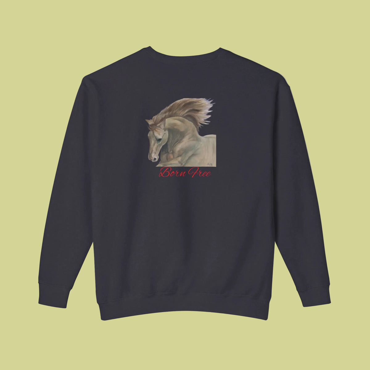 Unisex black crewneck sweatshirt featuring a graphic print o horse with the text 'Born Free' in red cursive below it in soft cotton