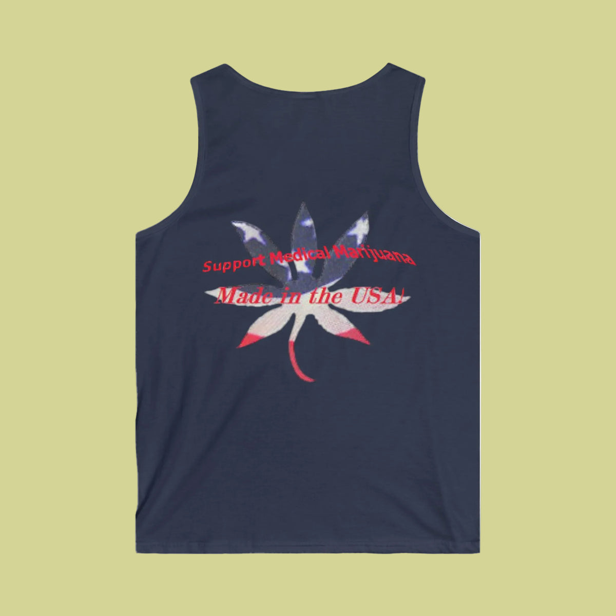 A navy blue tank top with a graphic on the BACK featuring a stylized cannabis leaf filled with the American flag pattern and red text reading 'Support Legal Marijuana Made in the USA'.