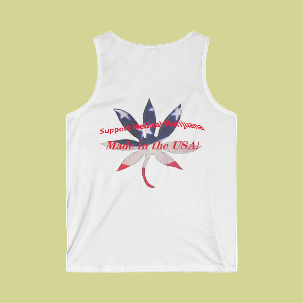 A men's white sleeveless tank top with a graphic on the BACK featuring a cannabis leaf filled with the American flag pattern and red text reading 'Support Medical Marijuana Made in the USA' on a plain white background.