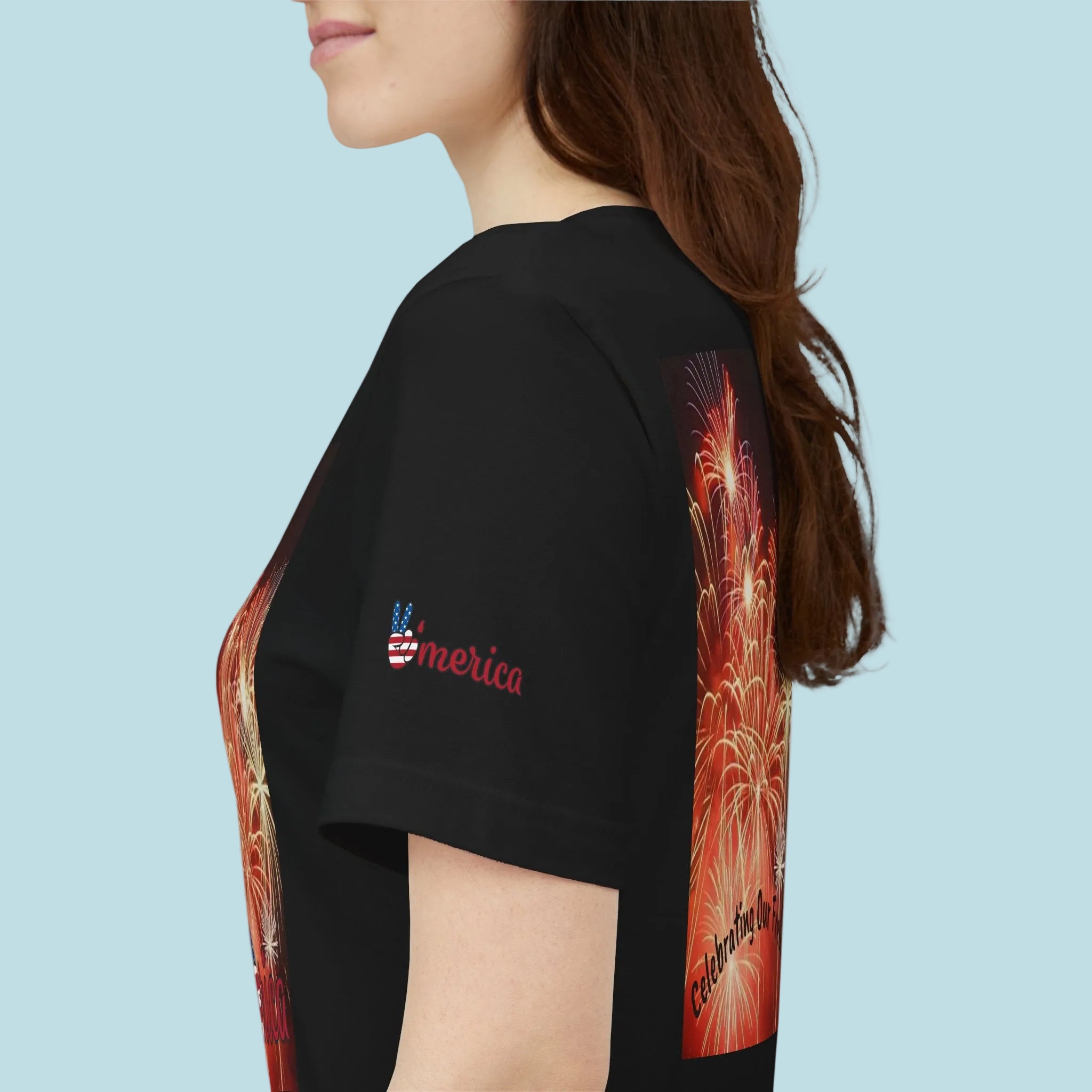 Black t-shirt with colorful design and 'America' text on sleeves