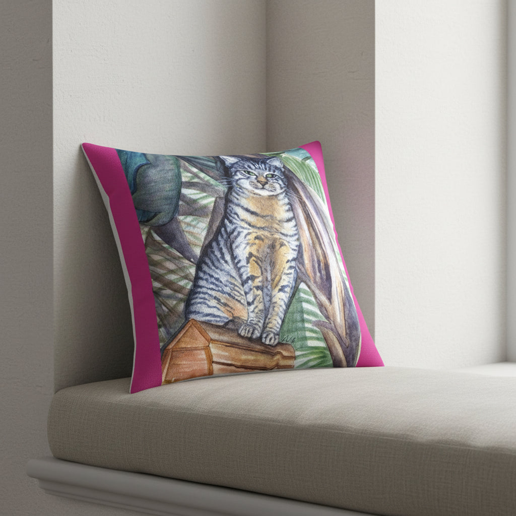 Decorative pillow with a cat and tropical leaf design