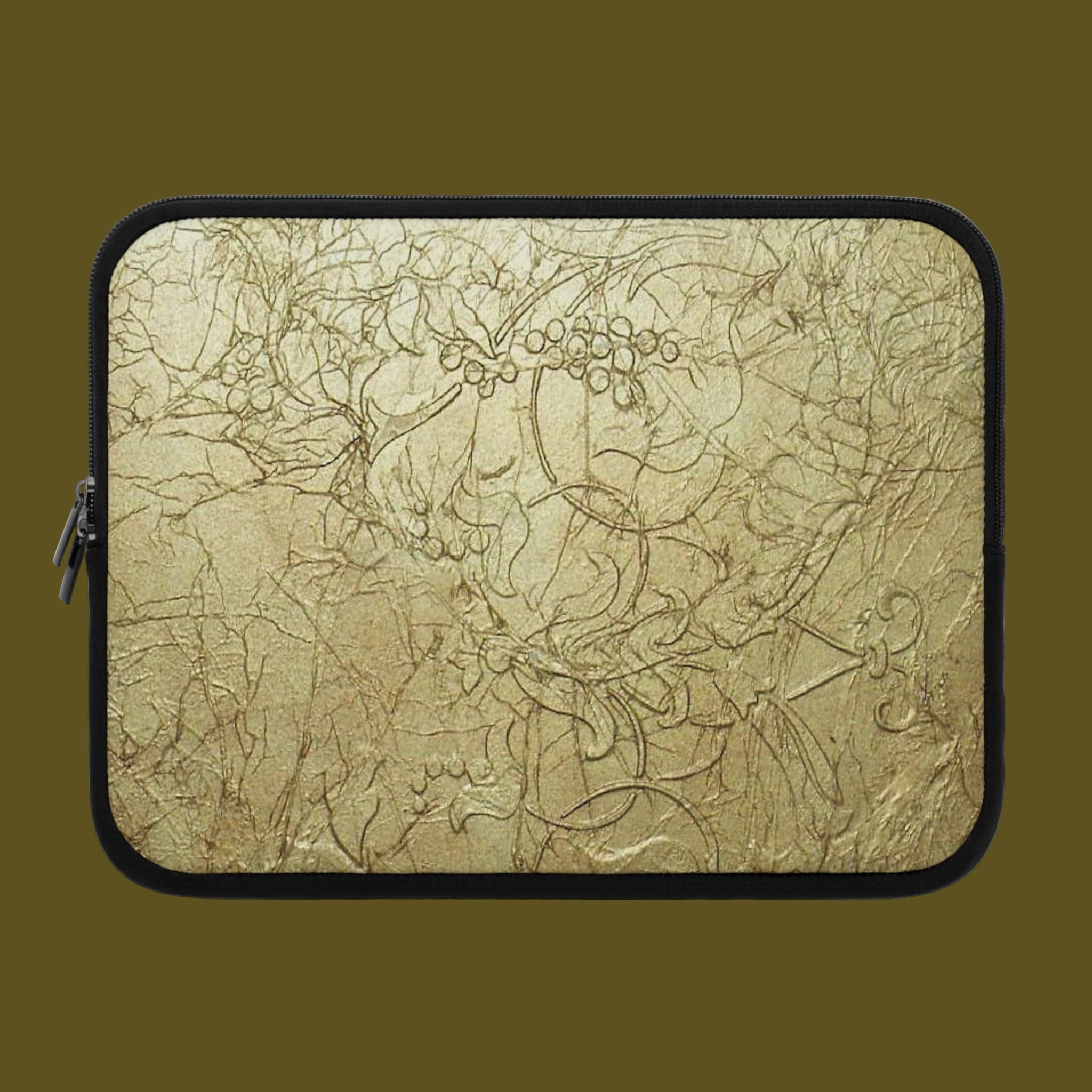 Laptop sleeve with intricate gold beige design with padded interior