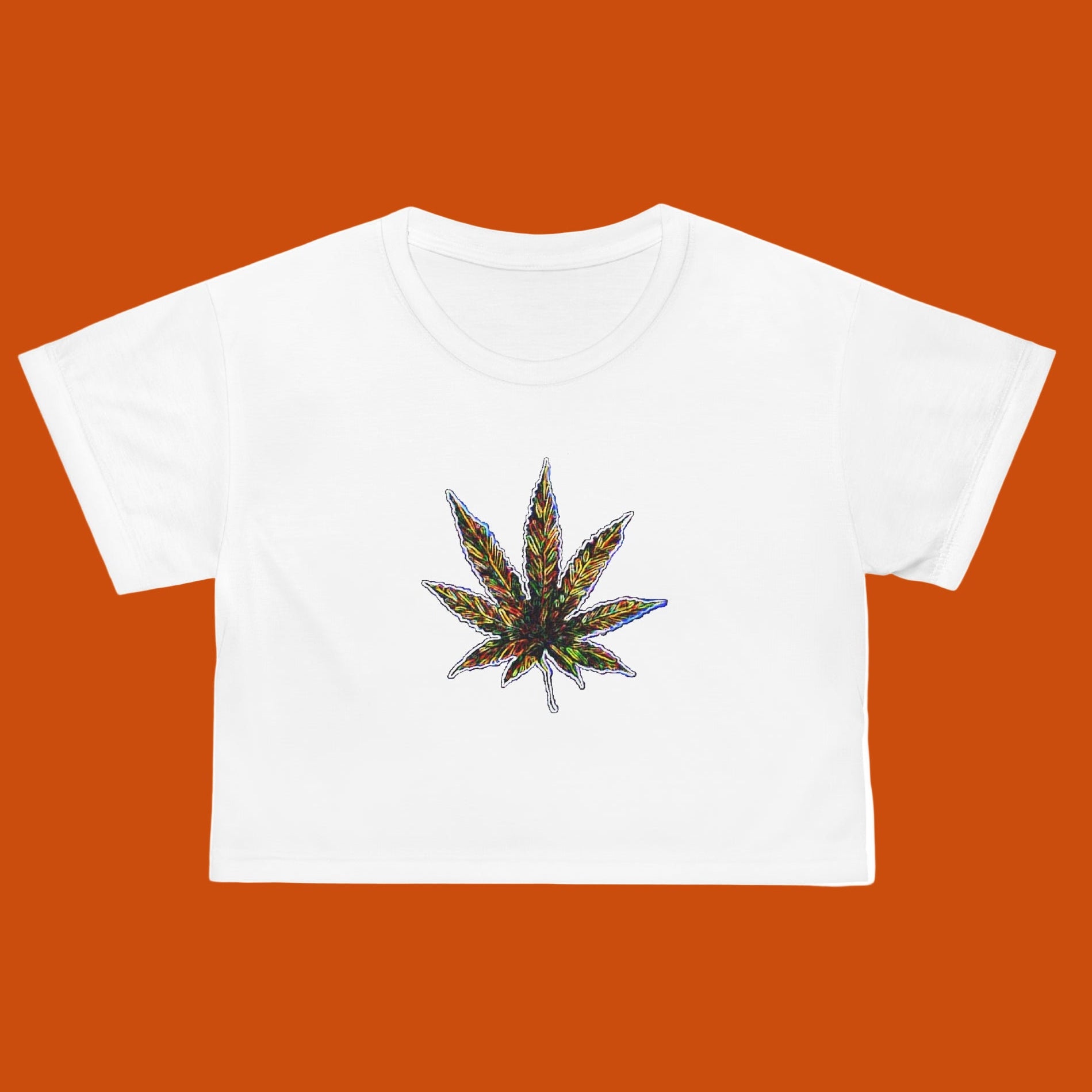 White crop T-shirt with a colorful cannabis leaf design by Studio Blitz - Great Gift Idea