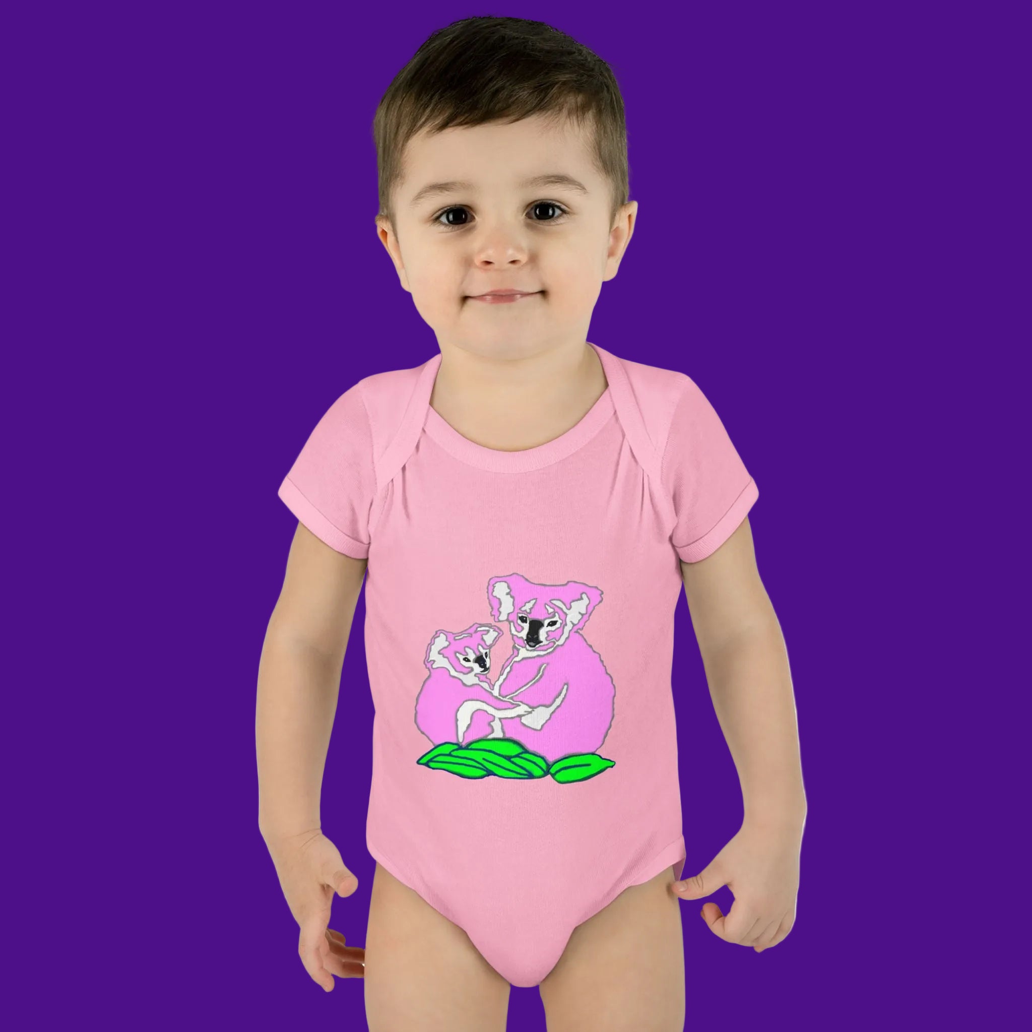 pink onesie with koalas also available in white and blue