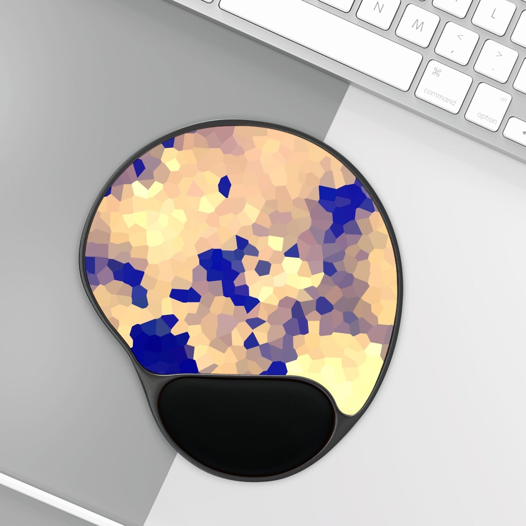 Mouse pad with wrist rest and artistic geometric pattern