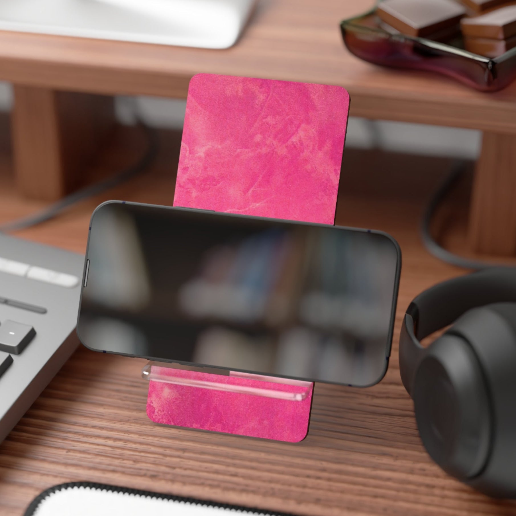 Pink phone stand in abstract design to match the phone case available in the same design