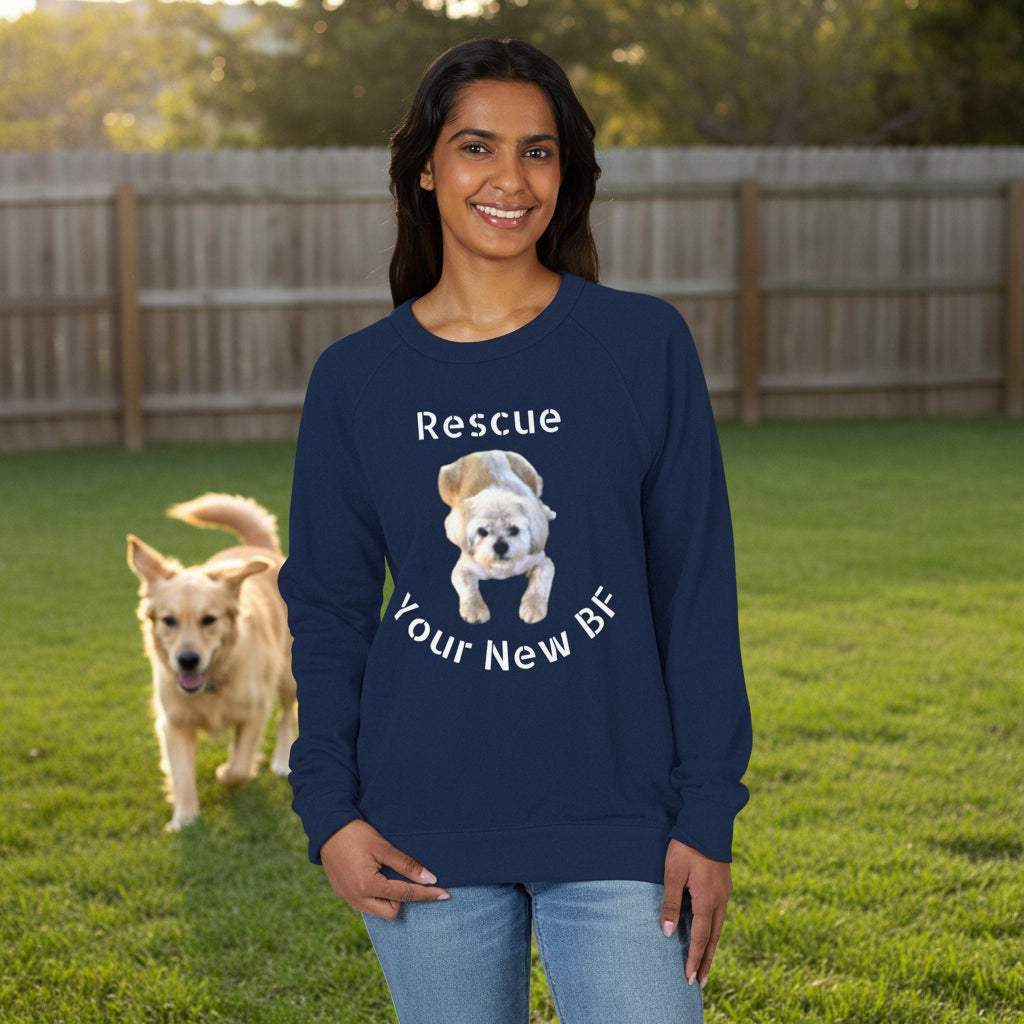 Person wearing a navy blue raglan shirt with a dog graphic and text