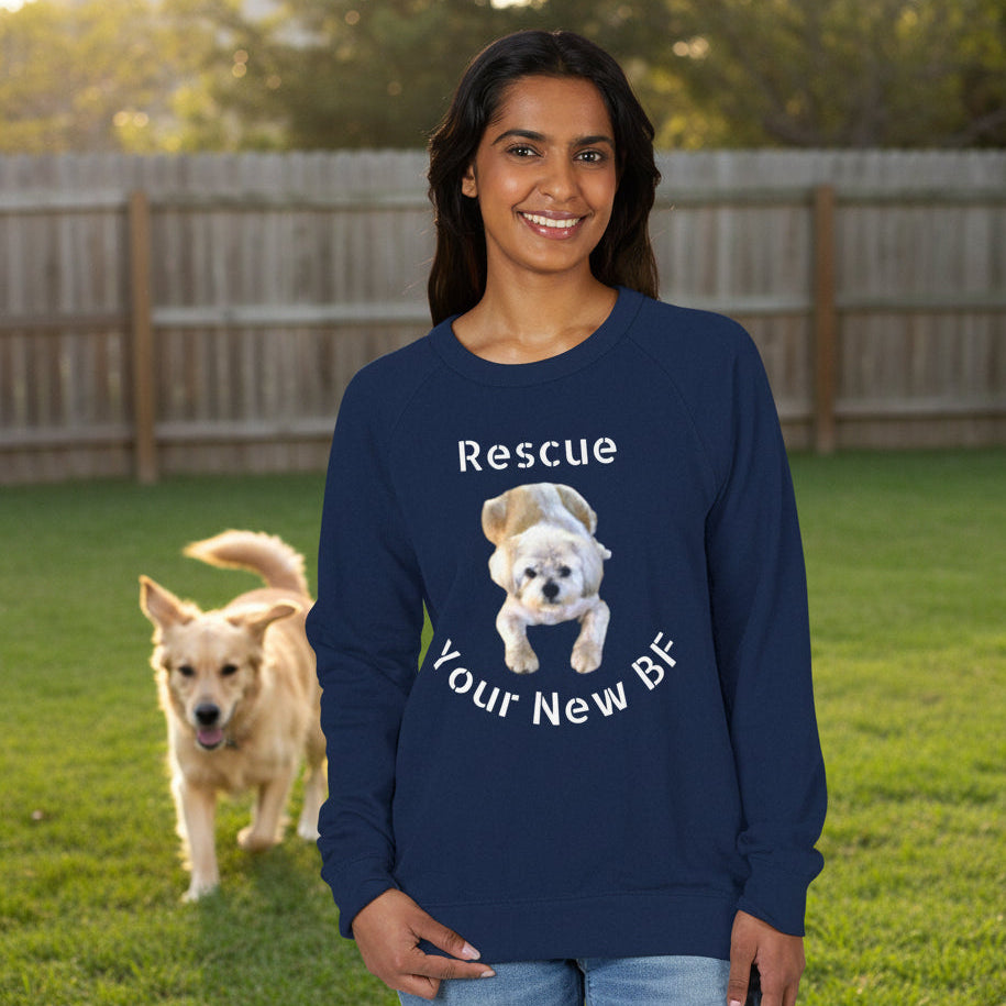 Person wearing a navy blue raglan shirt with a dog graphic and text