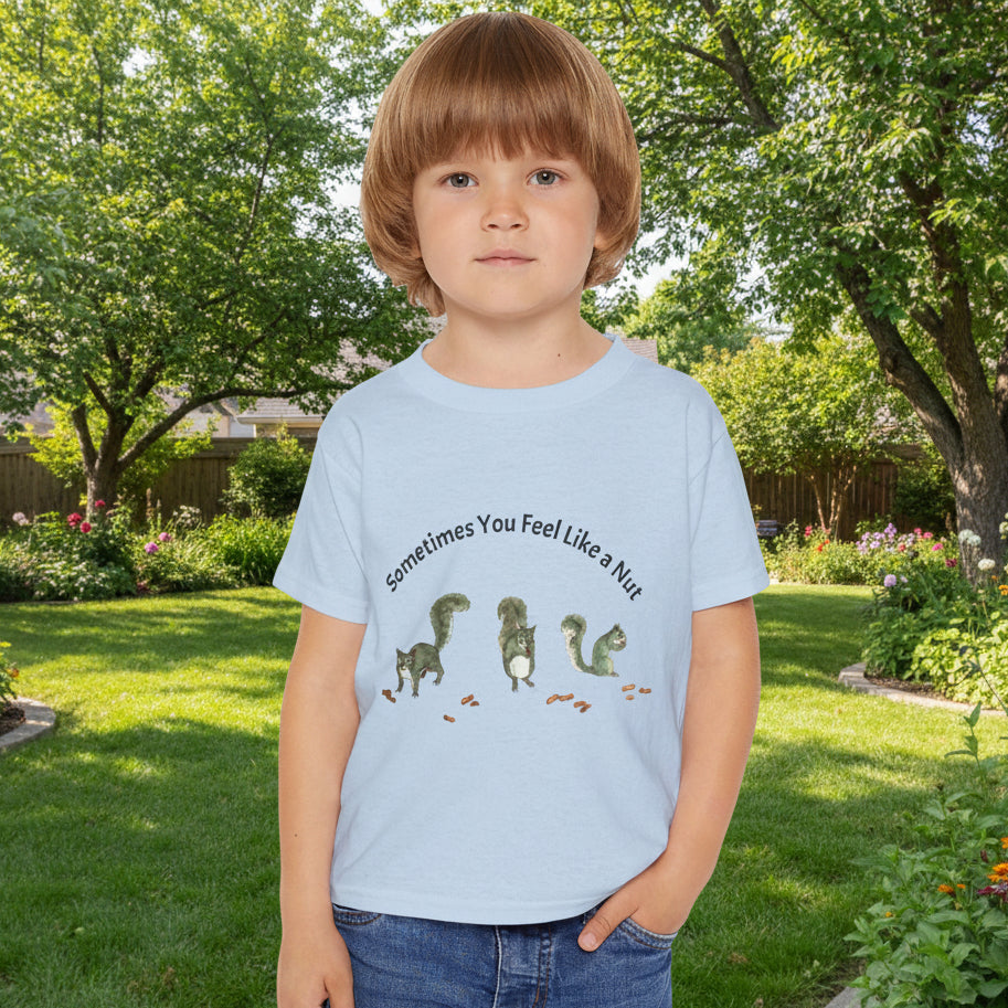 Child's light blue t-shirt with a squirrel graphic and the text 'sometimes You Feel Like a Nut'
