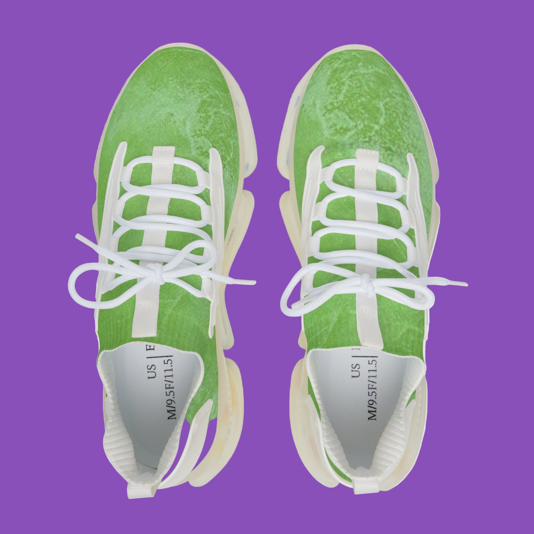 Green sneakers with white laces on a purple background