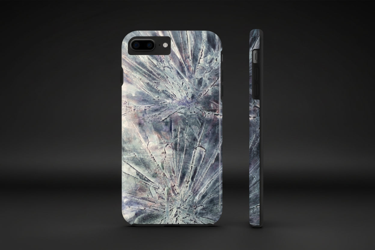 Phone case in abstract bursts of silver crystal design with rubber lining for strong impact and UV protection
