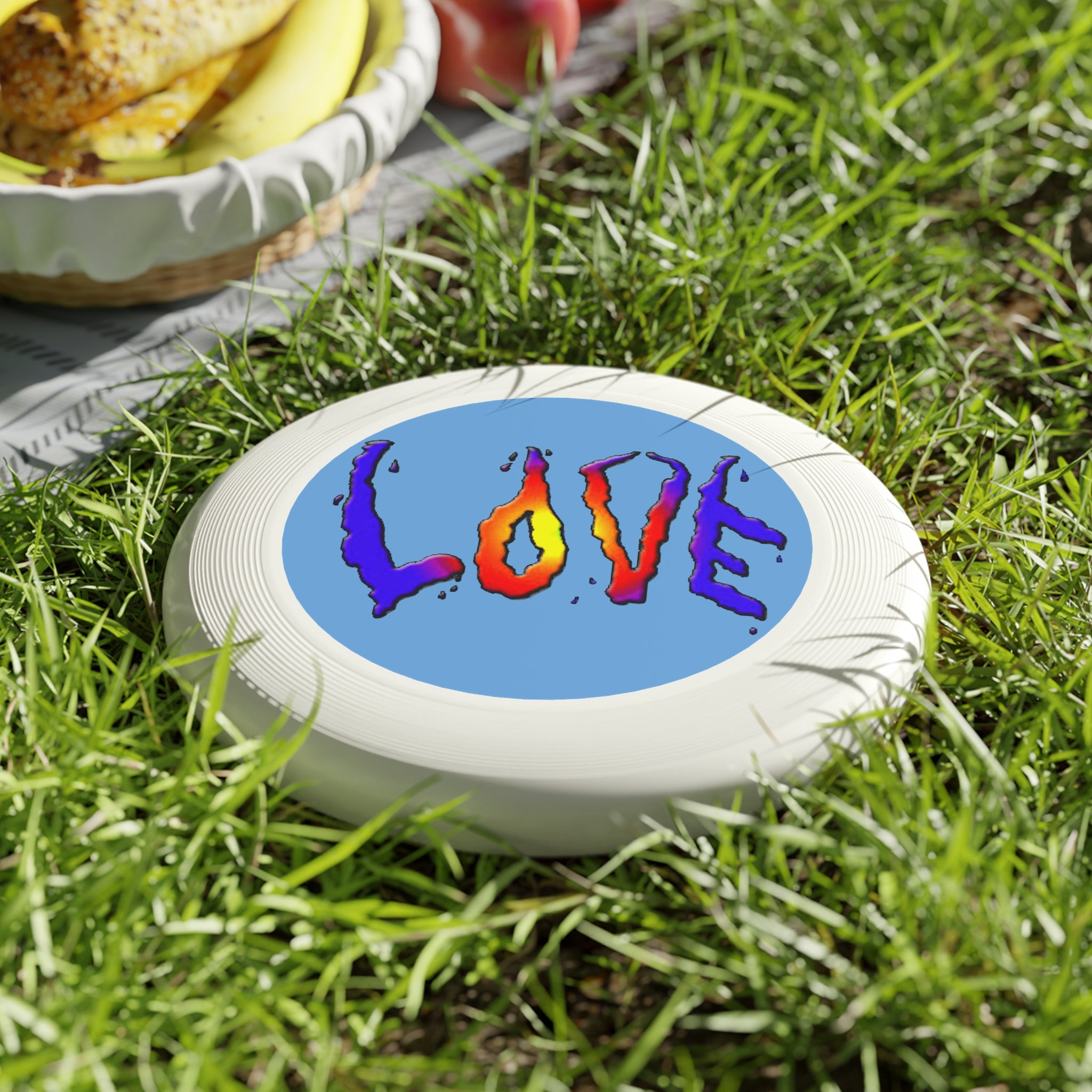 Frisbee with 'LOVE' painted in unique colorful letters