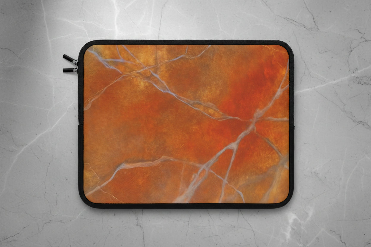 Laptop sleeve with orange red marble design is lightweight and zippered