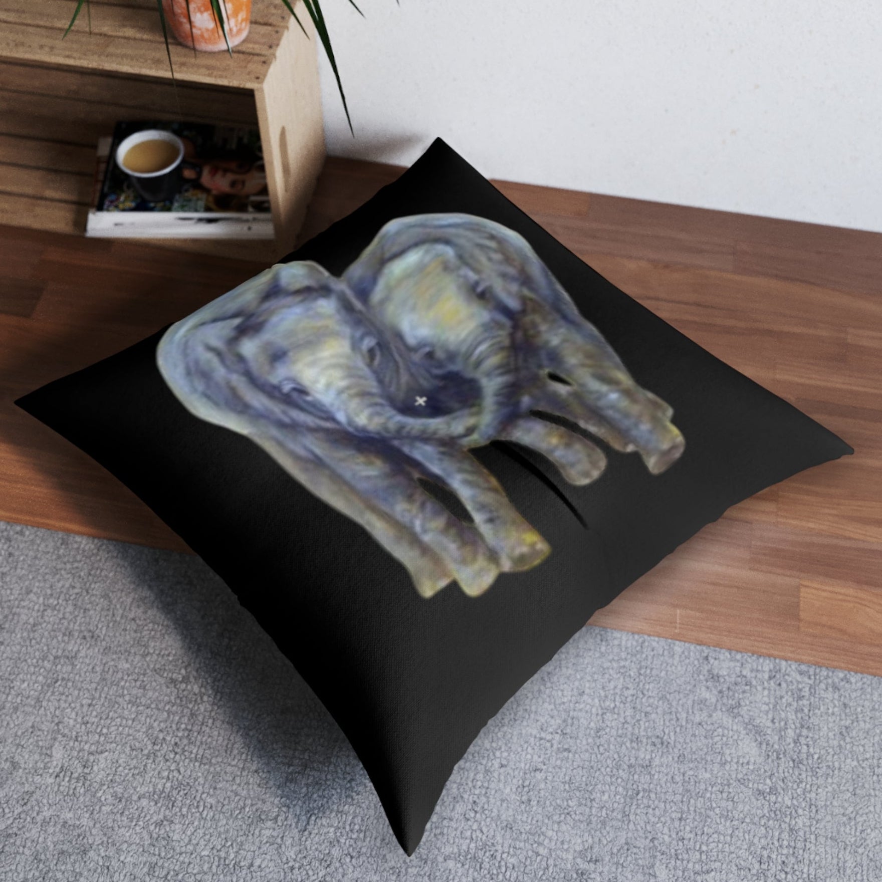 Decorative large floor pillow with painted elephants design makes a great room accent