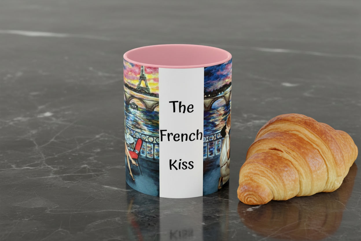 Mug with 'The French Kiss' artist painting of a romantic couple by Eiffel Tower in pink interior and handle.