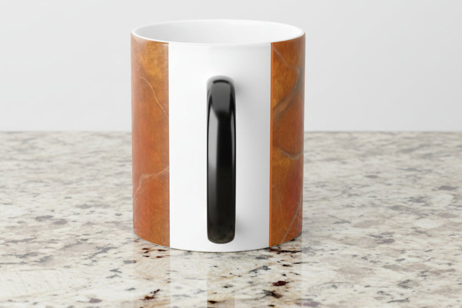 Mug with red orange marble sides and a black 'C' handle for extra comfort