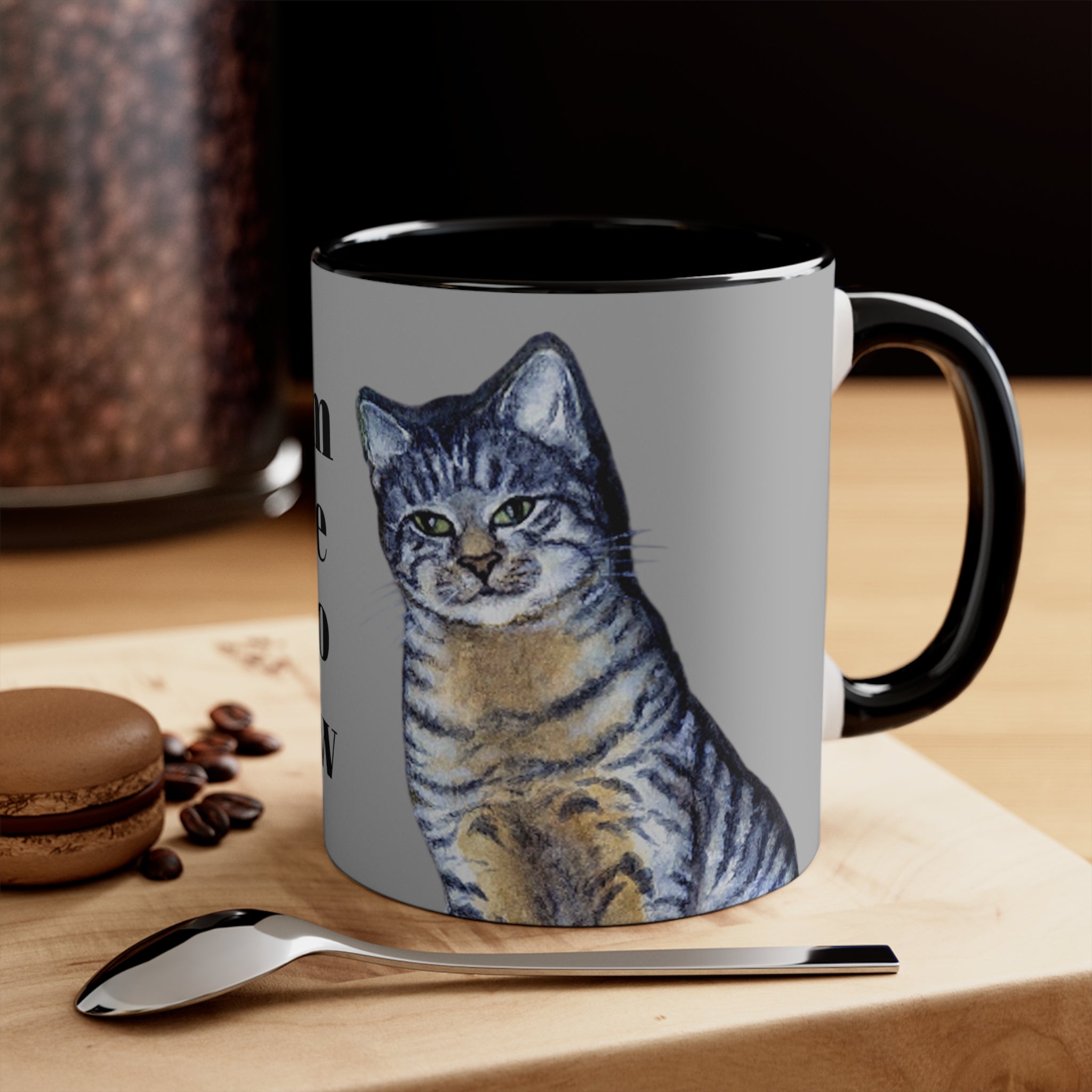 Mug with a cat design and big C handle for easy grip