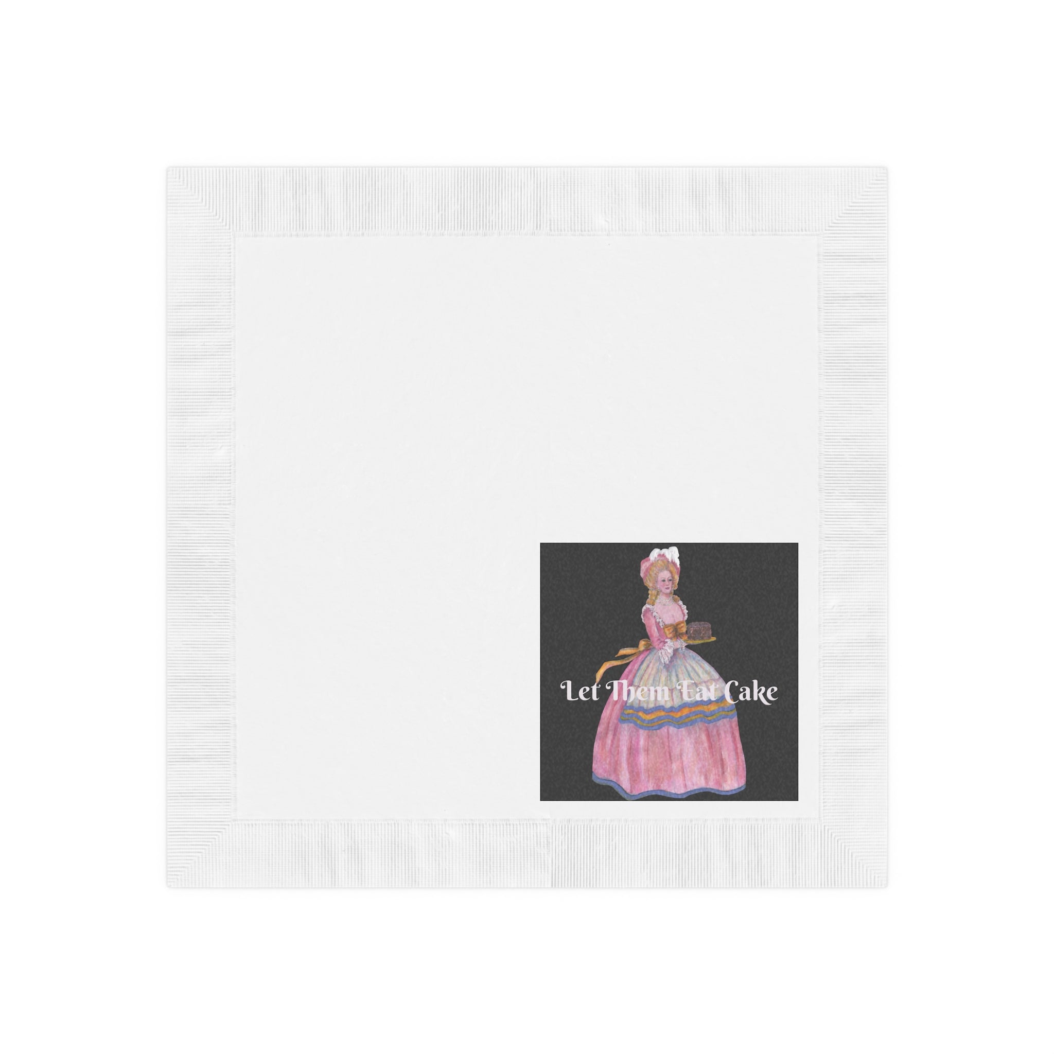 White napkin with a decorative design of a woman in a pink dress and 'Let Them Eat Cake' text on a black background.