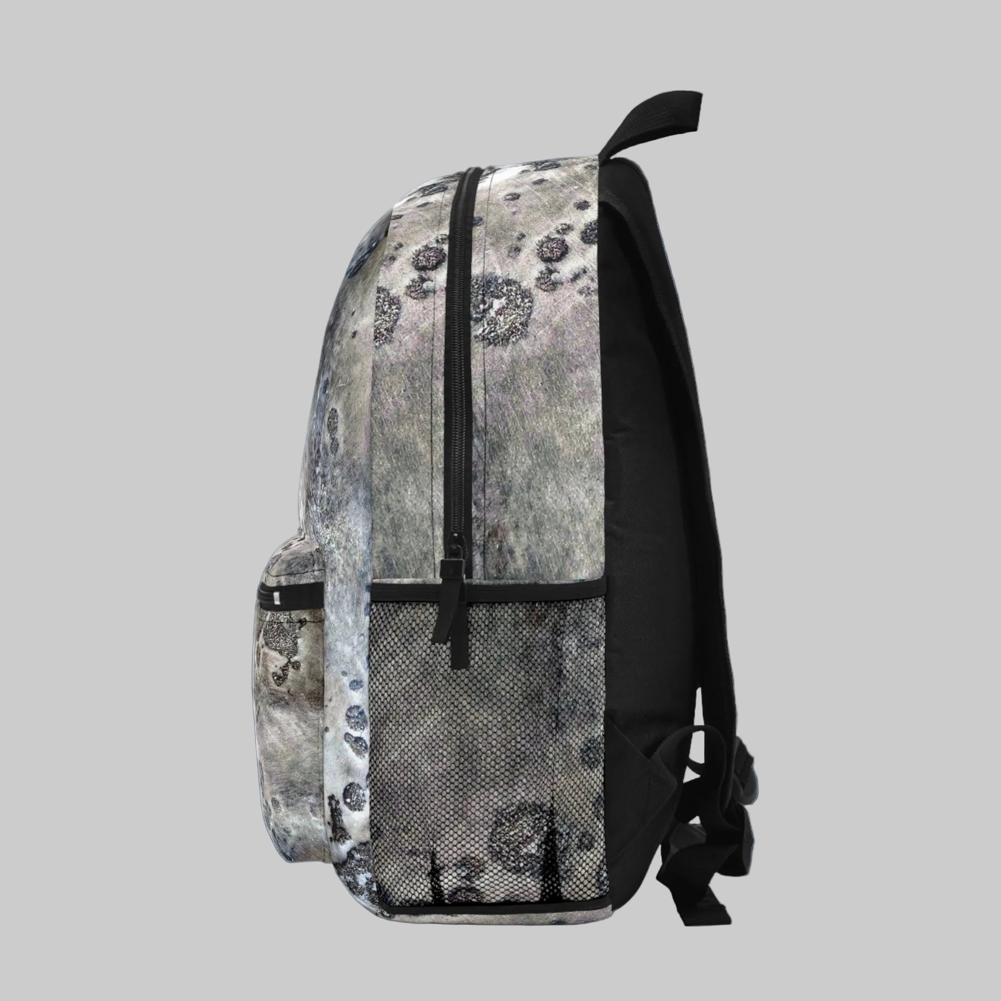 Backpack with a gray and black pattern on a blue background