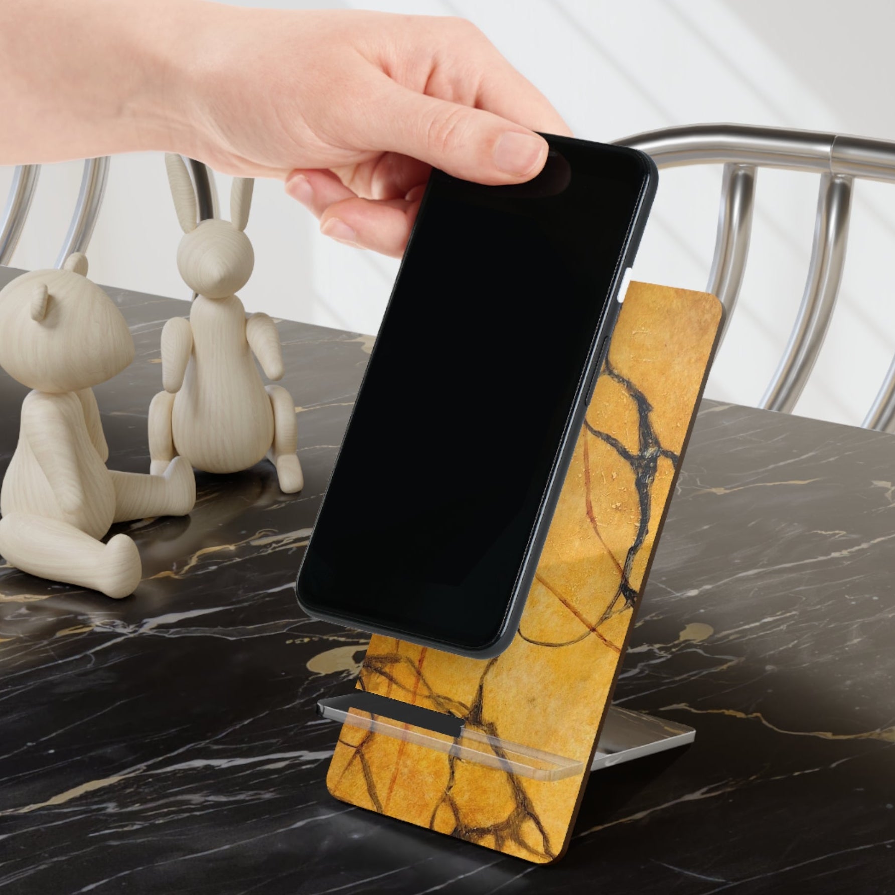 Gold marble phone stand is sturdy and painted eye catching design