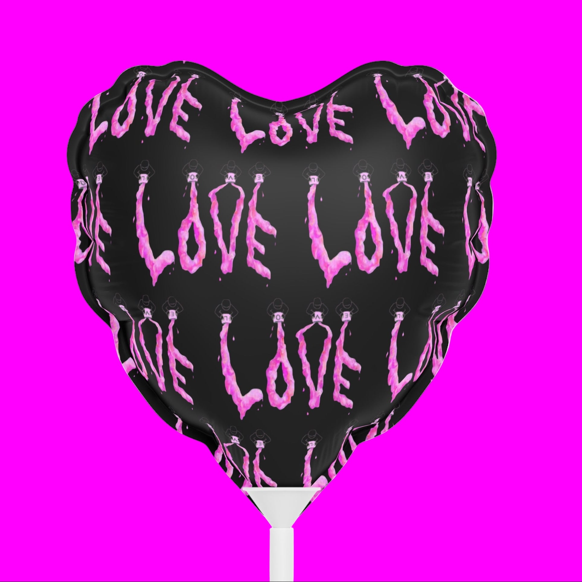 Heart-shaped foil balloon with 'LOVE' text in pink on a black background