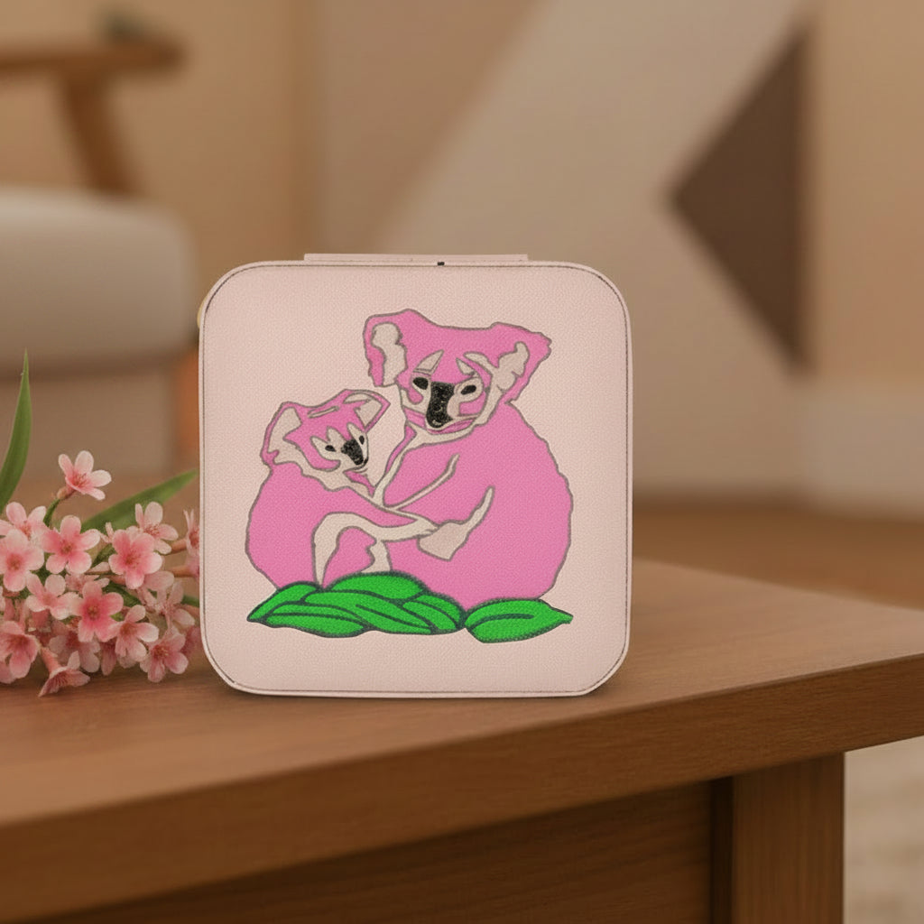 Pink traveler's jewelry case with painted koalas