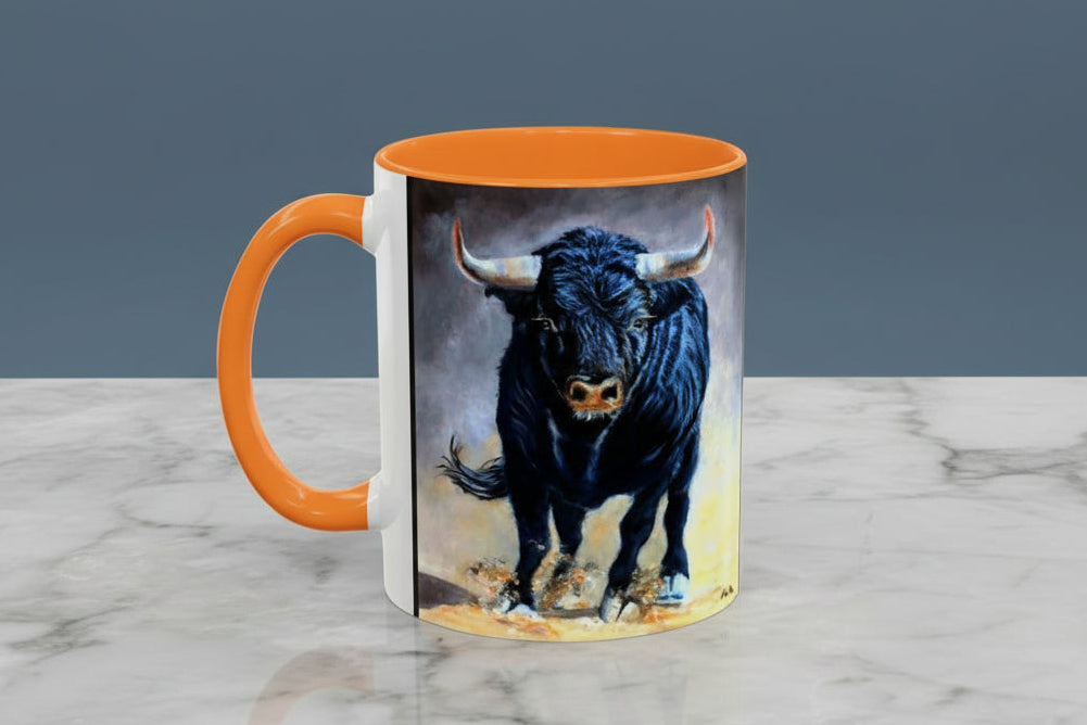 Mug with a charging bull painting with gold/orange accents