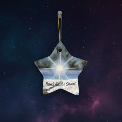 Star-shaped ornament with a bright shining star in the universe design and 'Reach for the Stars!' text.