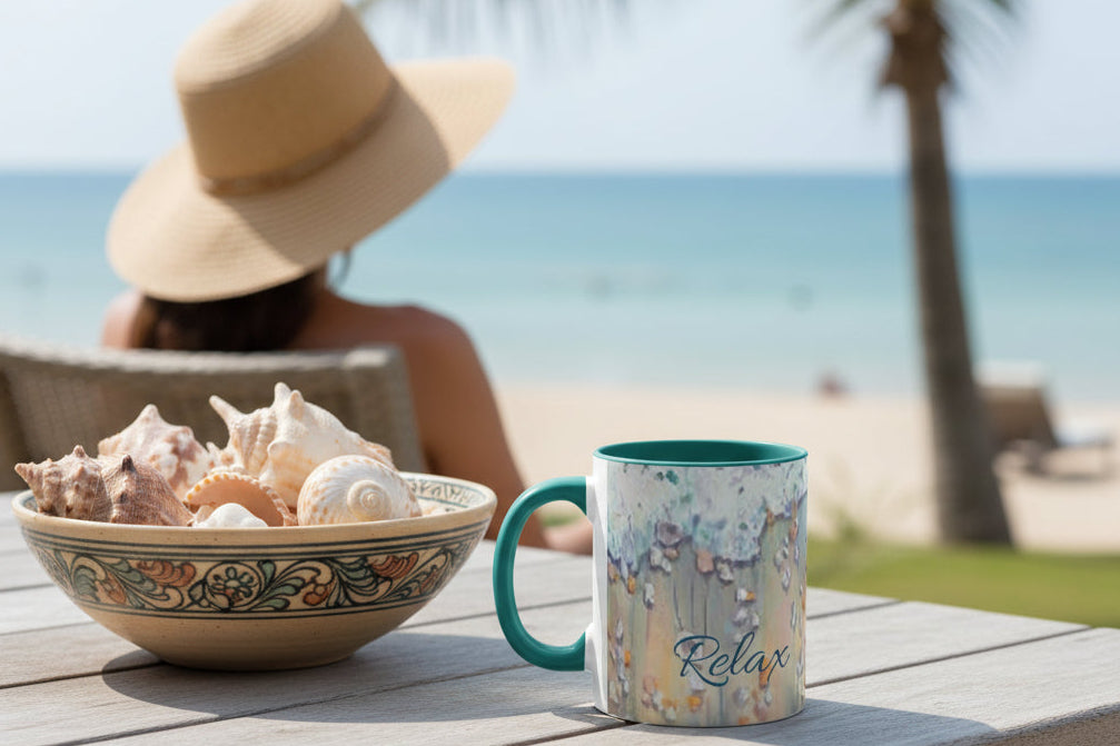 Mug painted with ocean surf design and 'Relax' text and green accent colors