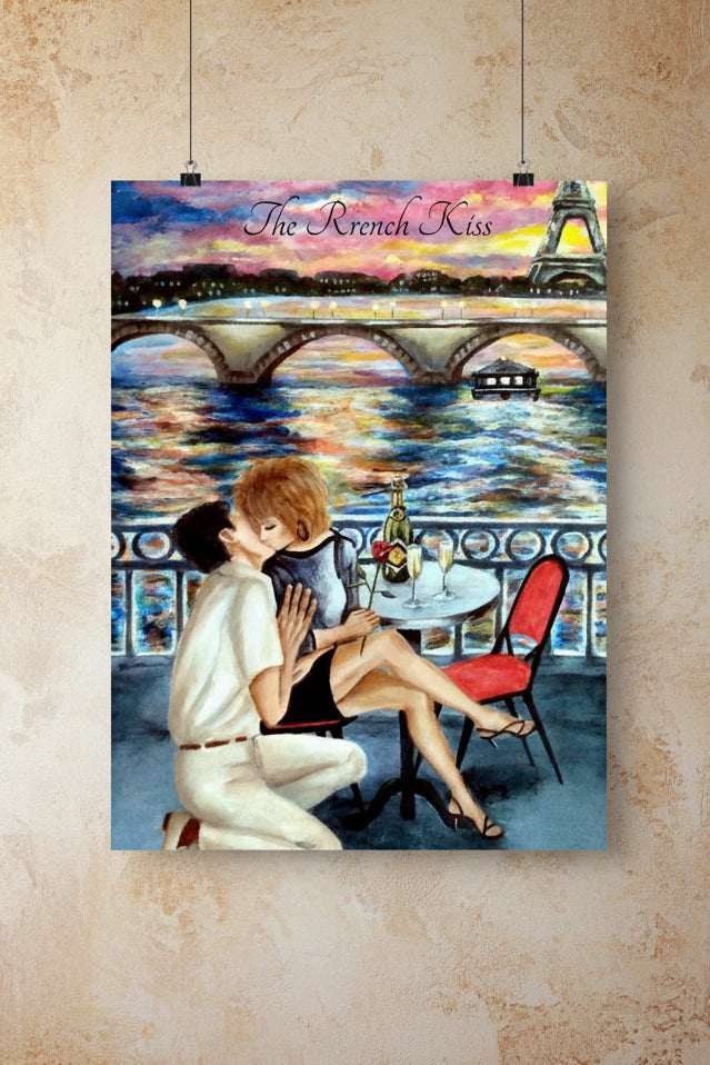 A vertical art print featuring an illustration of a romantic couple kissing on a Parisian balcony, with a bridge, river, Eiffel Tower, and the text 'The French Kiss' at the top.