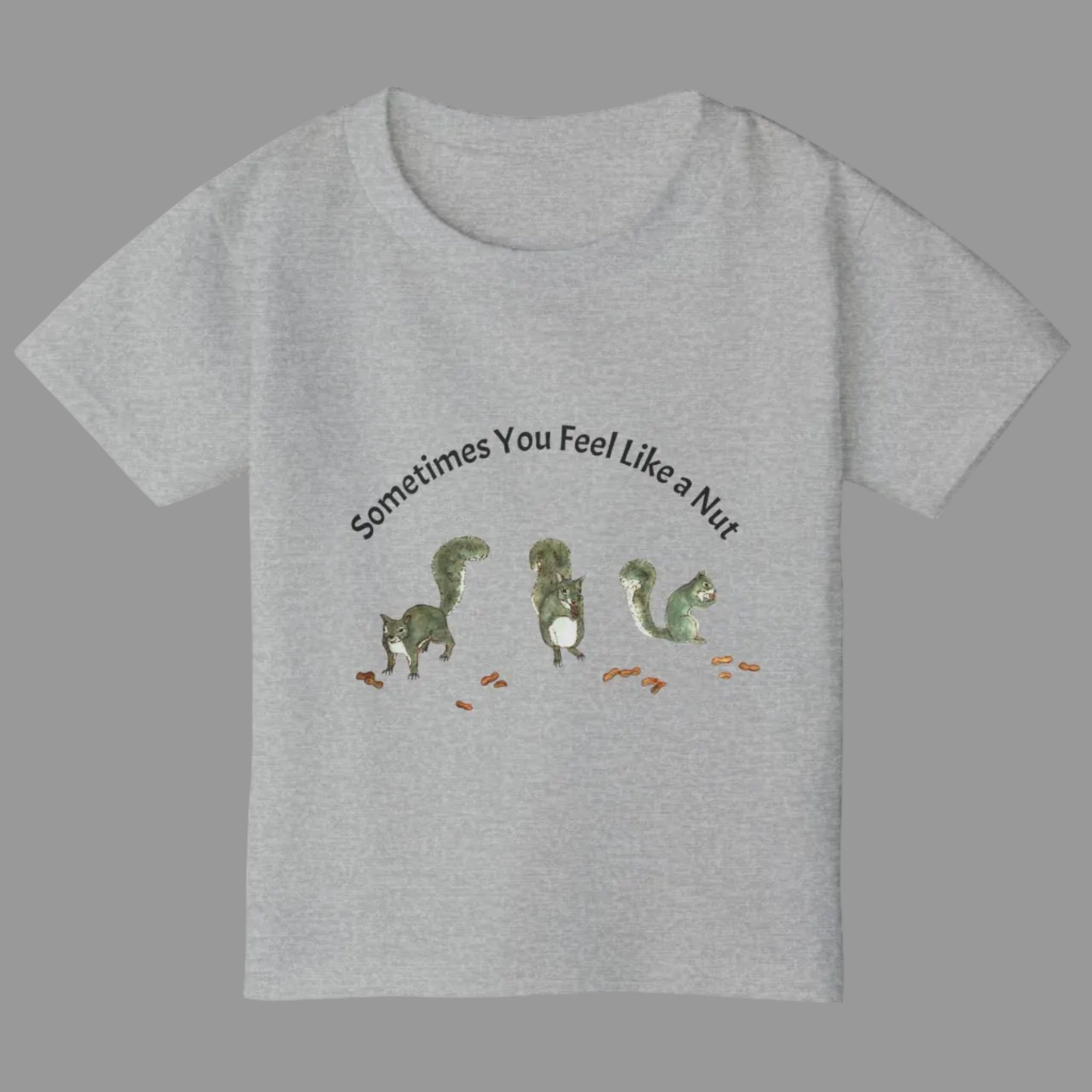 A sport gray short-sleeve t-shirt with a graphic of squirrels eating nuts and the text 'Sometimes You Feel Like a Nut'
