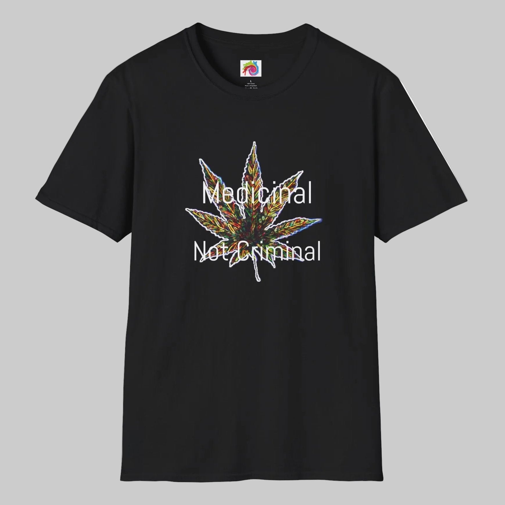 A black short-sleeve crewneck t-shirt featuring a colorful cannabis leaf graphic with the text 'Medical Not Criminal' printed in white over it.
