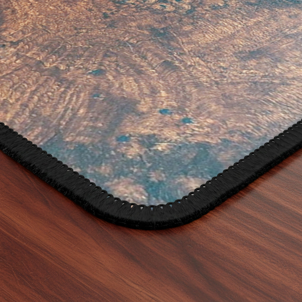 Close-up of a mouse pad with a corner with hemmed premium finish