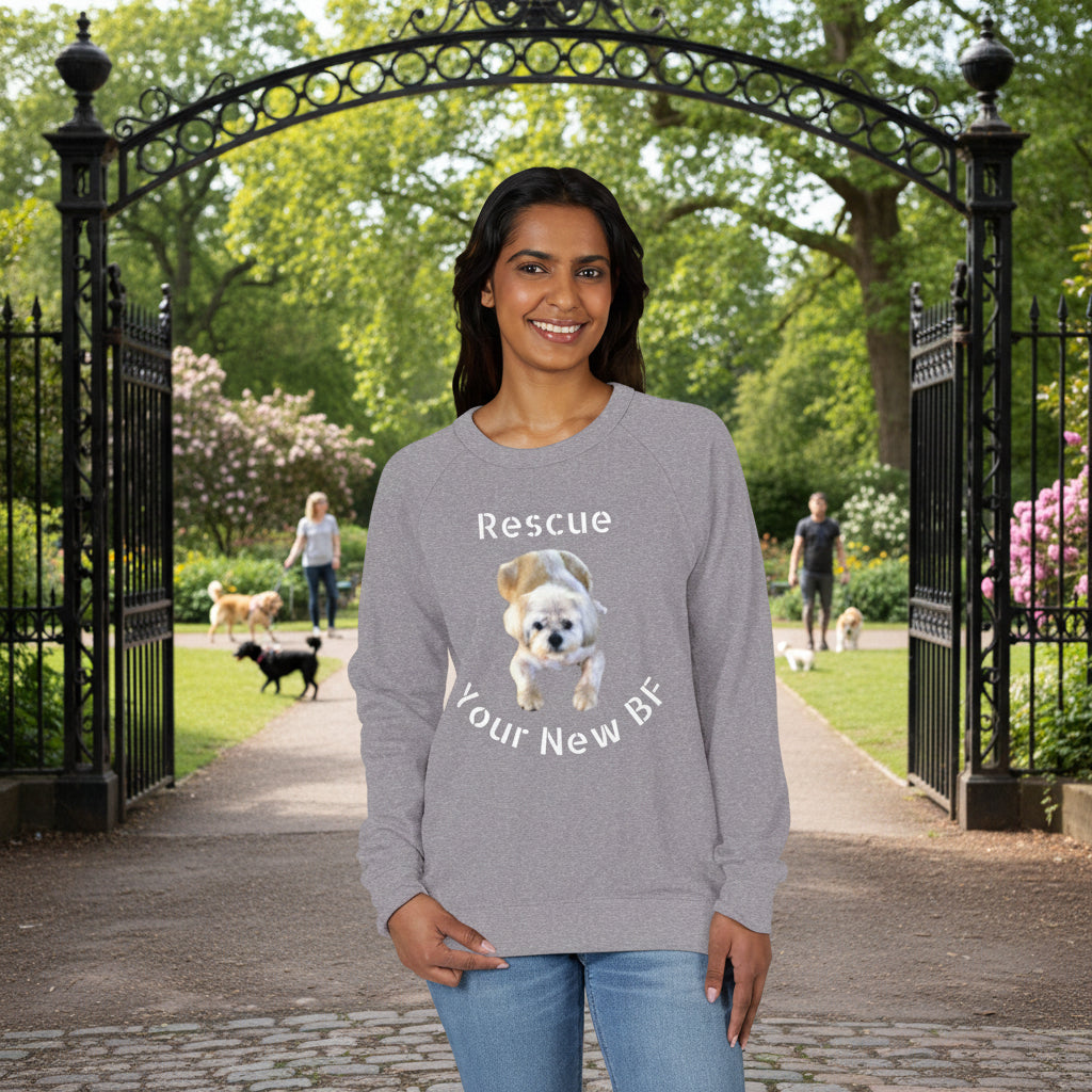 Person wearing a heather gray raglan
shirt with a dog graphic and text