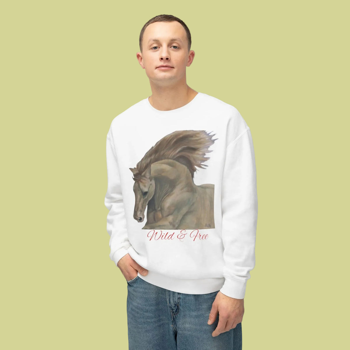 Unisex white crewneck sweatshirt with a graphic print of a wild horse and the text 'Wild & Free' in red script