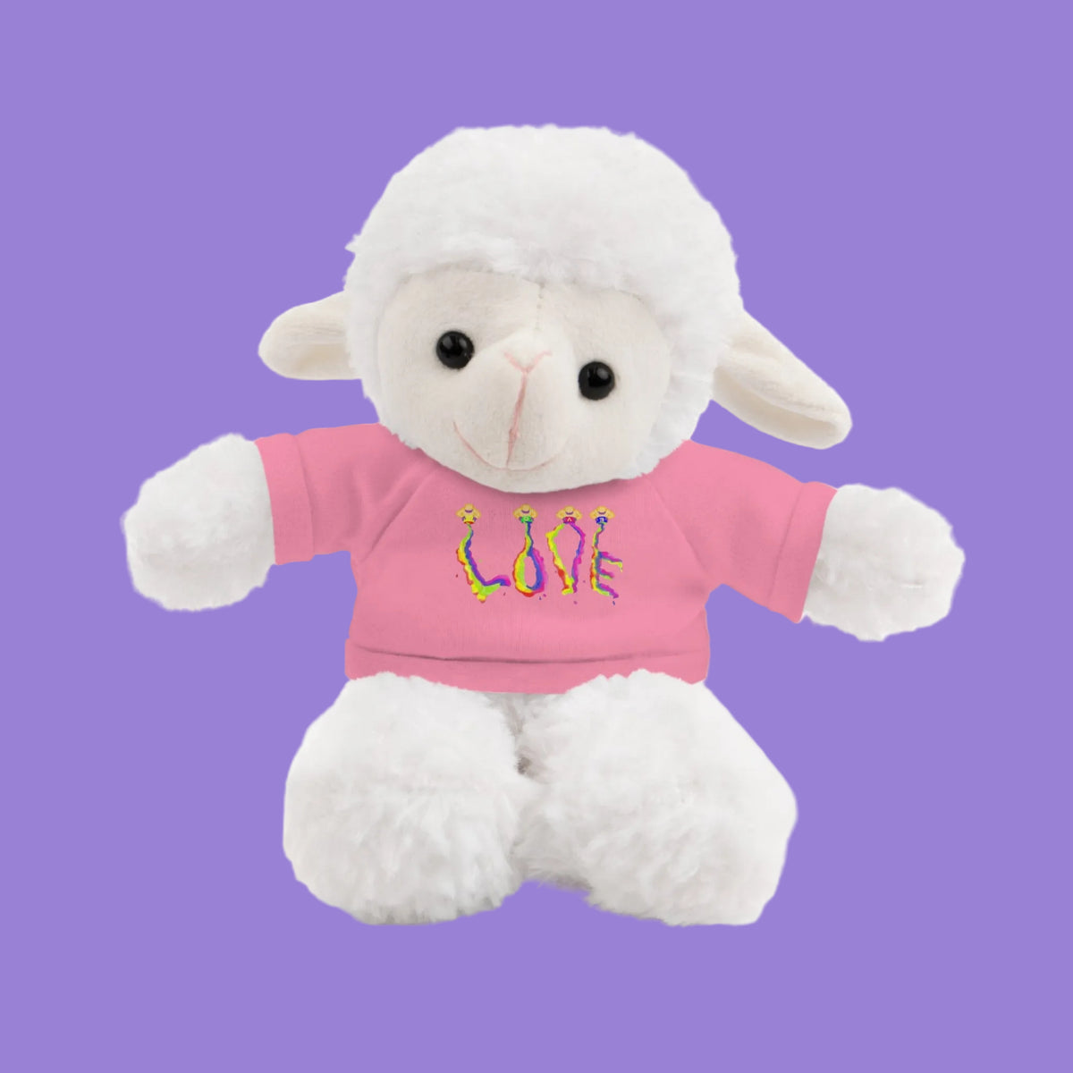 A white plush sheep toy wearing a pink shirt with colorful embroidered letters spelling 'LOVE' on the chest