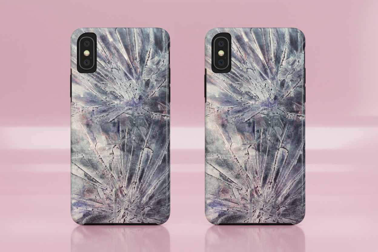 Phone case in abstract bursts of silver crystal design with rubber lining for strong impact and UV protection