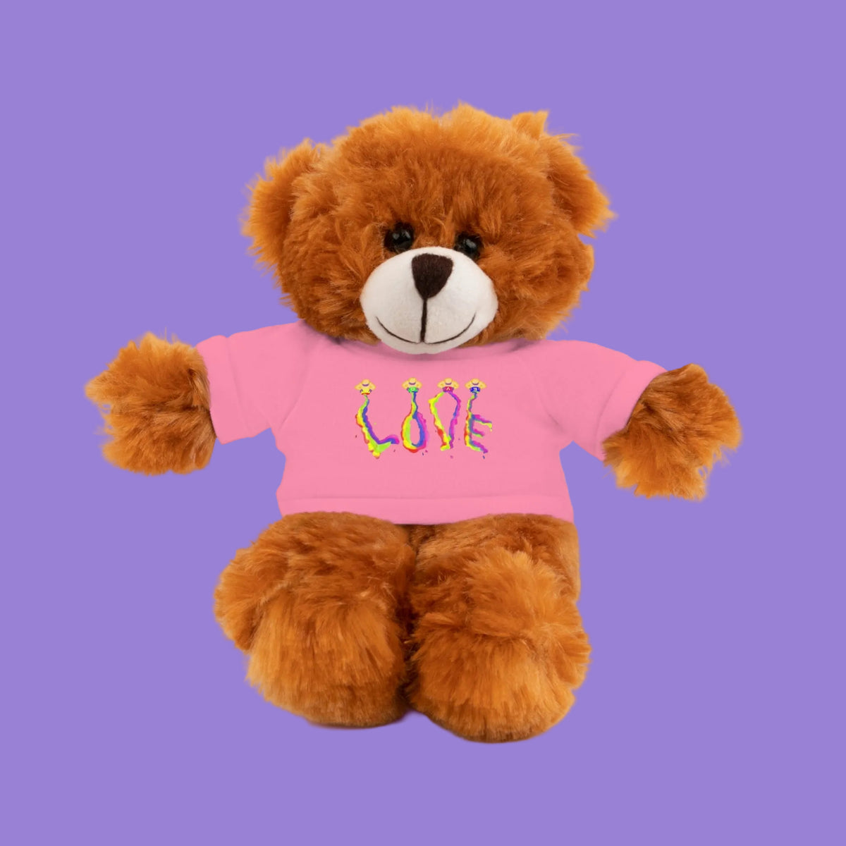 Brown teddy bear wearing a pink tee shirt with LOVE graphic