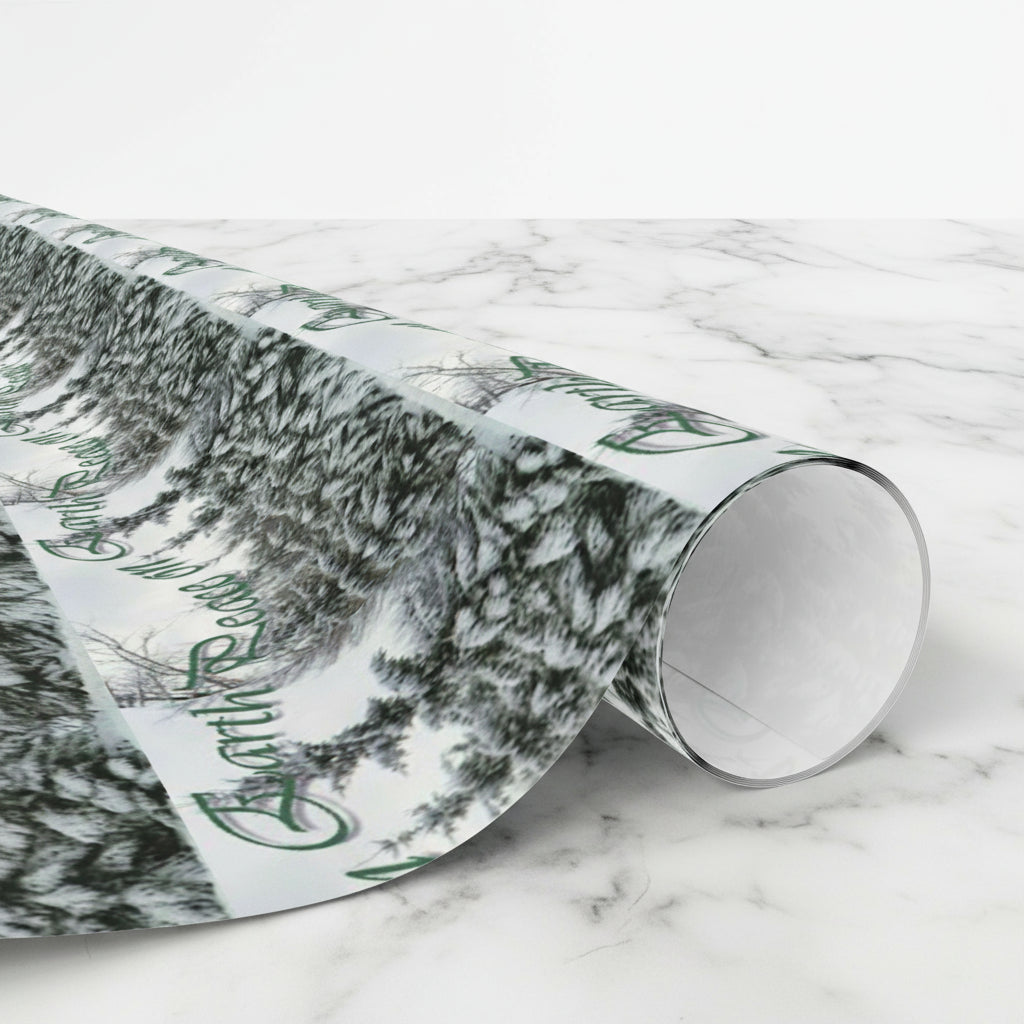 Roll of holiday wrap with a forest design on a white background